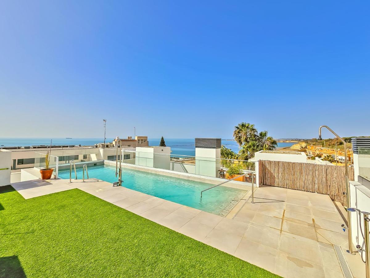 Oceanfront Duplex With A Rooftop Pool And Terrace 엘푸에르토데산타마리아 외부 사진